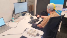 A post-stroke patient receiving brain-computer interface-based rehabilitation therapy