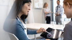 A doctor explaining findings from a brain scan to a patient 
