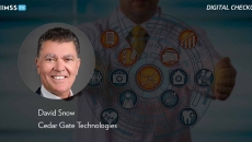 Dave Snow, Cedar Gate Technologies_Doctor holding medical and financial icons Photo by LeoWolfert/iStock/Getty Images Plus
