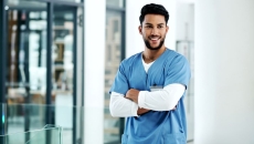 Person standing with arms crossed