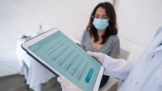 A patient being registered into a digital database