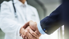 Two people shaking hands