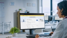 A doctor using Provider Mode on a desktop computer in her office.