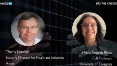 Thierry Marchal and María Angeles Pérez_ Human hand and robot hand touching Image by Shutter2U/iStock/Getty Images Plus