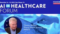 Tom Hallisey at HANYS_ Doctor looking at brain scan on table Photo: katleho Seisa/Getty Images