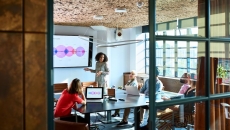 A woman presenting to investors