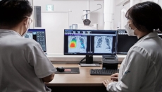 Radiologists checking an X-ray analysis from Lunit INSIGHT CXR