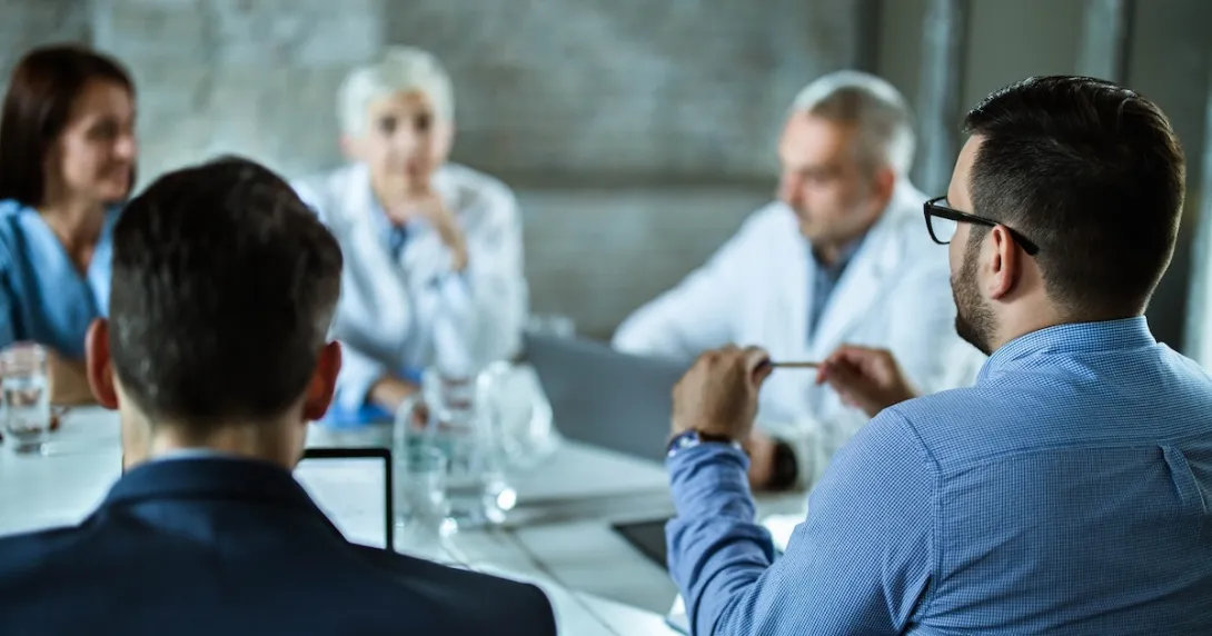 Professional staff in conference