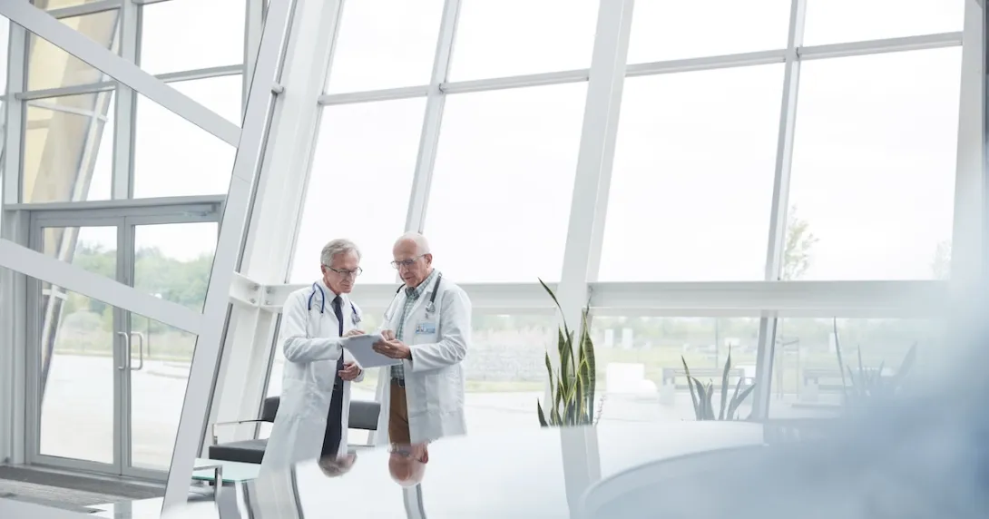 Healthcare professionals conferring 