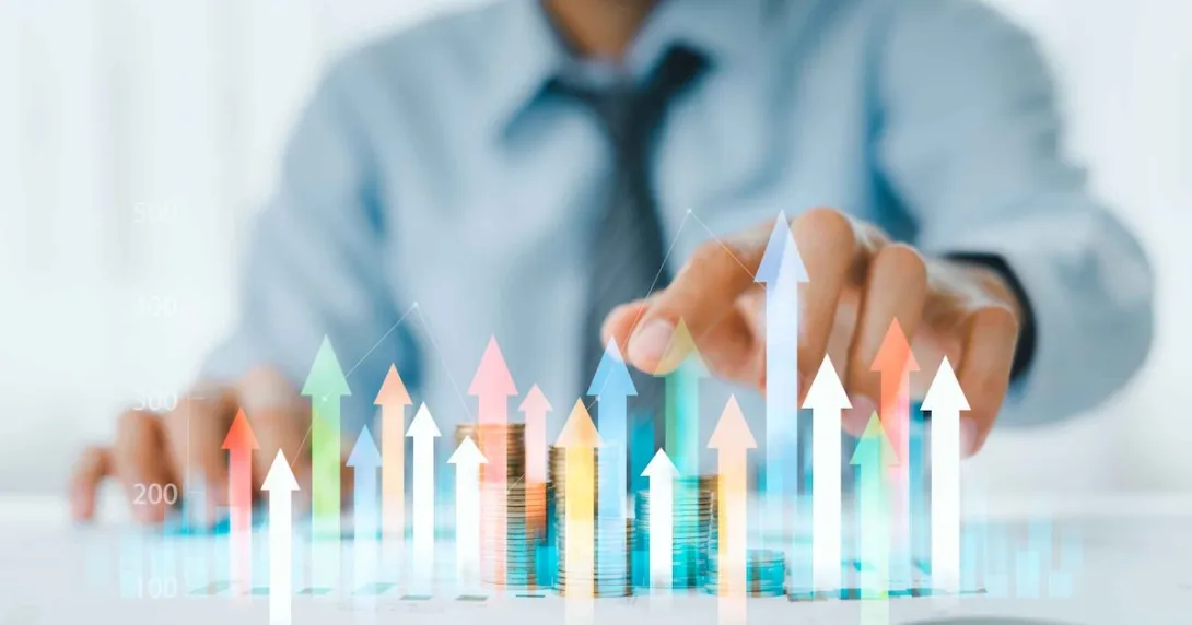 Businessperson and a digital interpretation of a financial graph