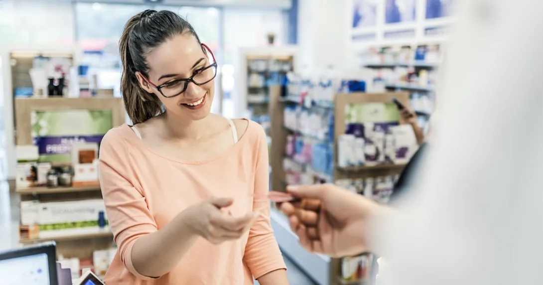 Woman interacting with a pharmacist