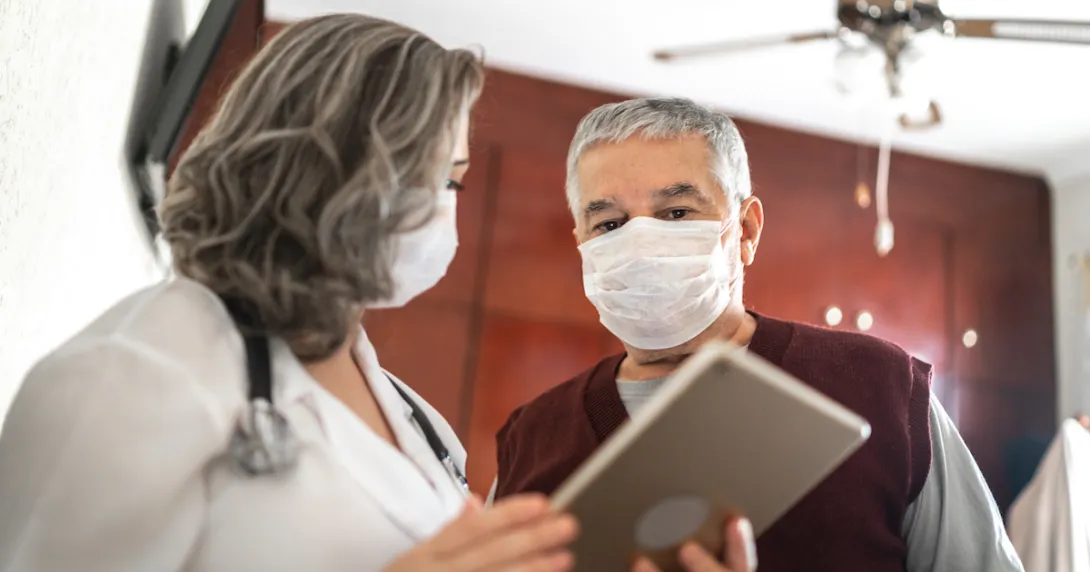 Healthcare provider and patient talking to each other