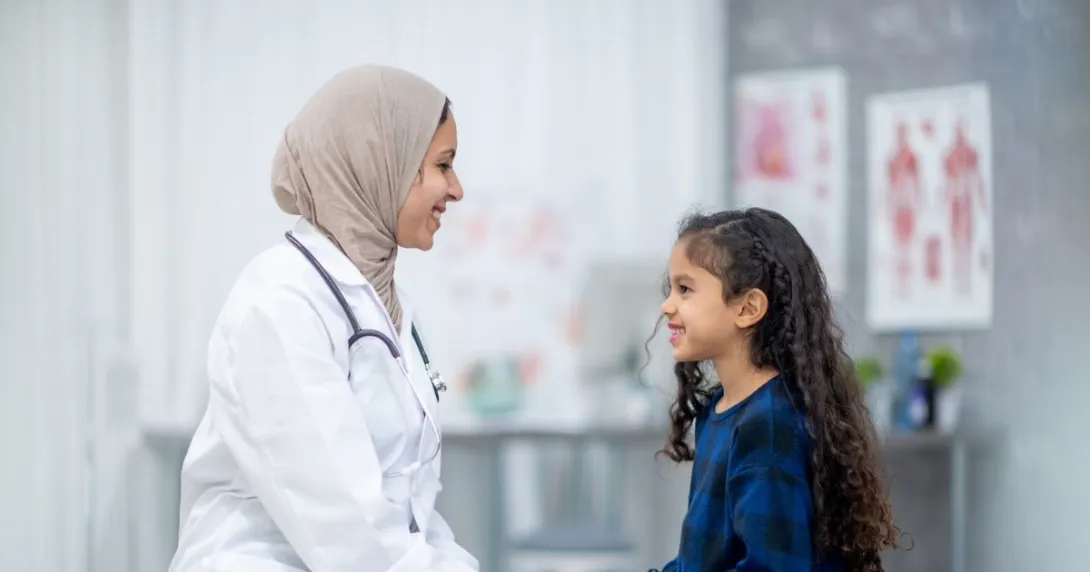 Two people sitting and discussing