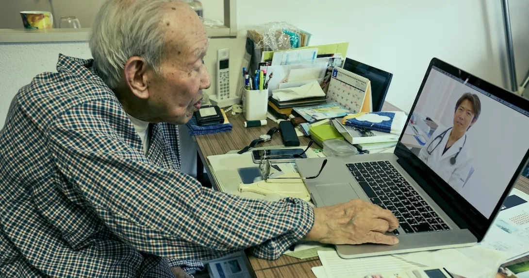 Person interacting with a healthcare professional via a telehealth visit