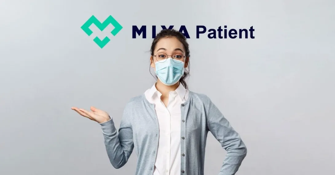A patient model wearing mask poses behind MiyaPatient