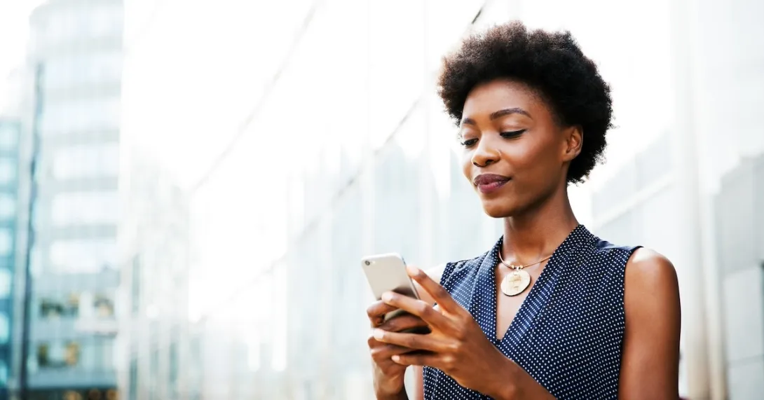 Patient looking at medical records on smart phone