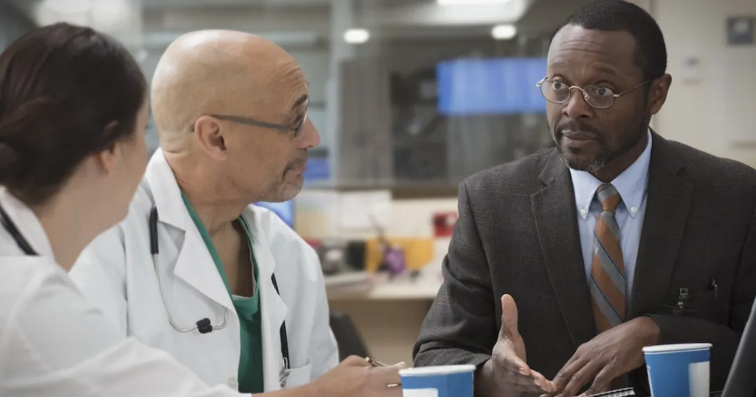 Clinicians, administrator in conference