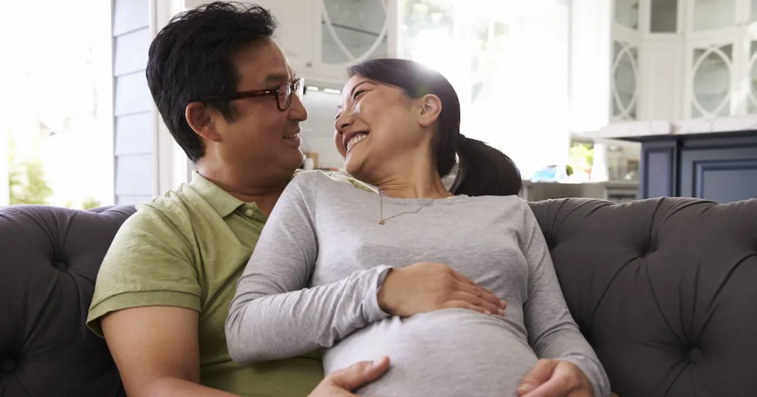 A pregnant woman and her partner