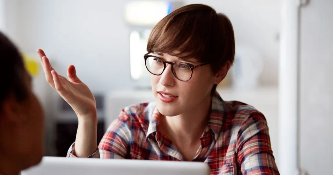 Person looking at open laptop